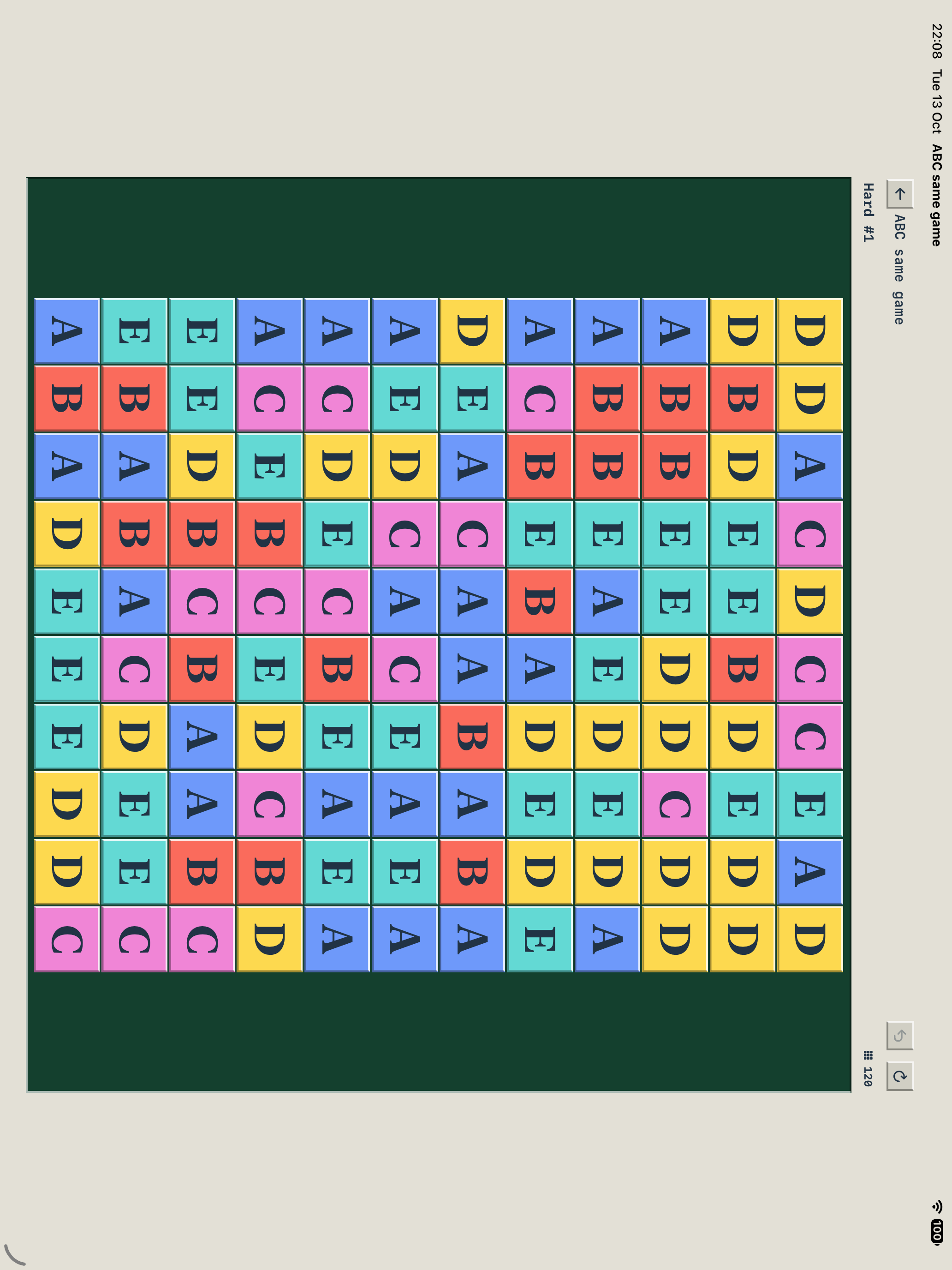 Actual iPad gameplay: the larger Hard level 1 board with five letter colors.